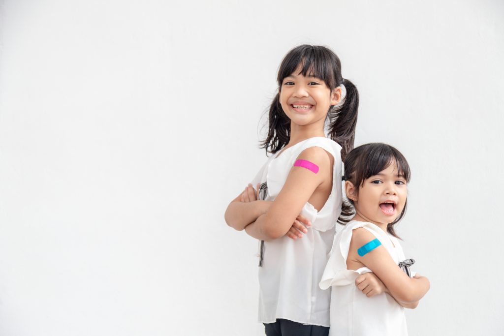 Asian Little girl Feel Good After Received a Vaccine