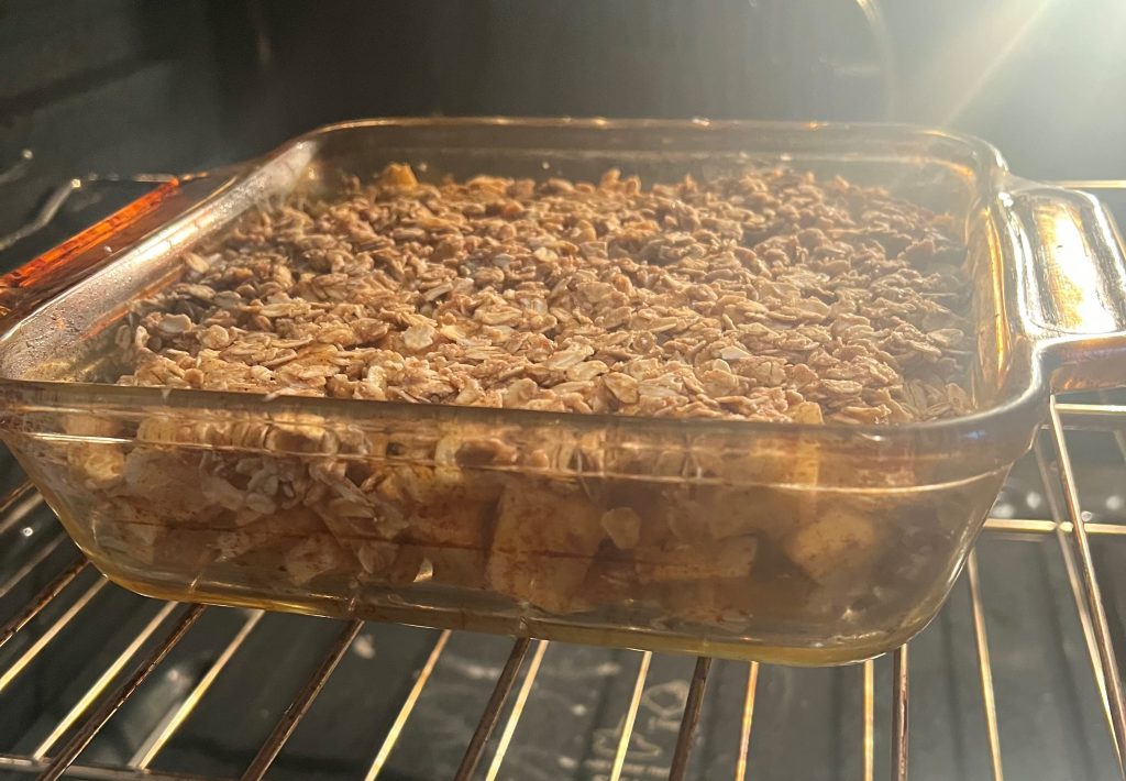Apple crumble baking in oven