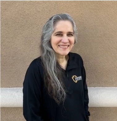 Luz Quezada smiles warmly.