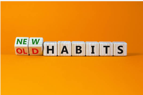 Image that has blocks which spell new and old habits.
